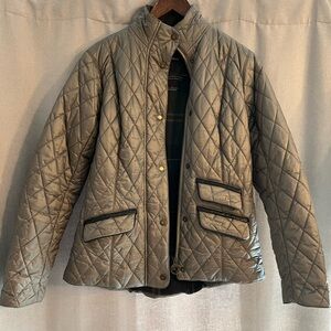 Classic Barbour quilted jacket with plaid lining.